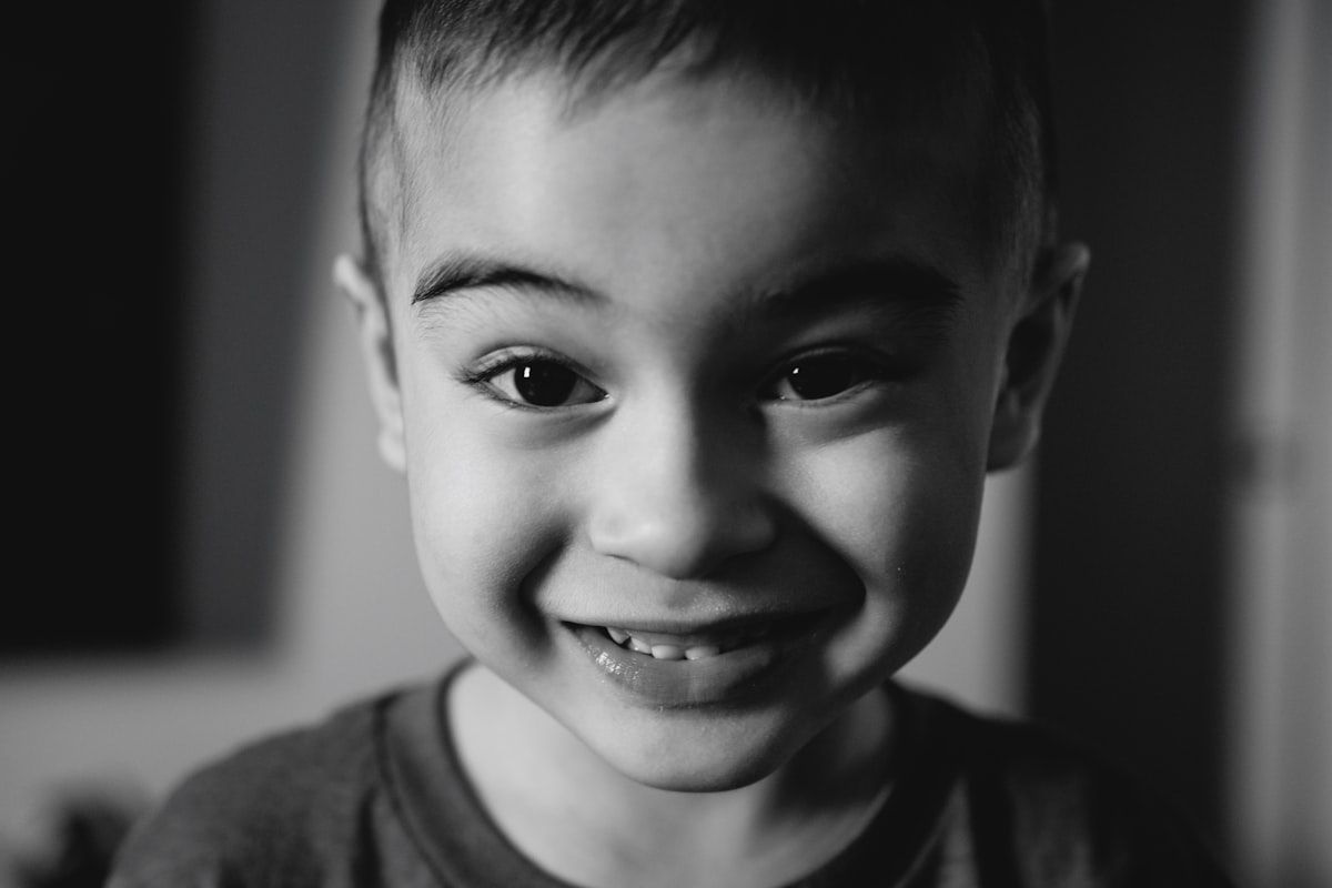 Smiling young boy, illustrative photo for airway health article