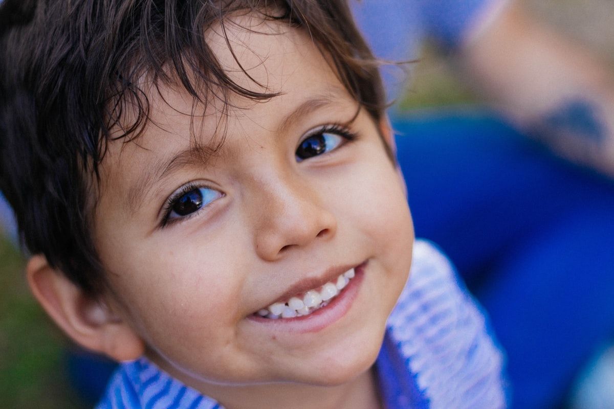Close-up of a smiling child, illustrative photo for airway health article